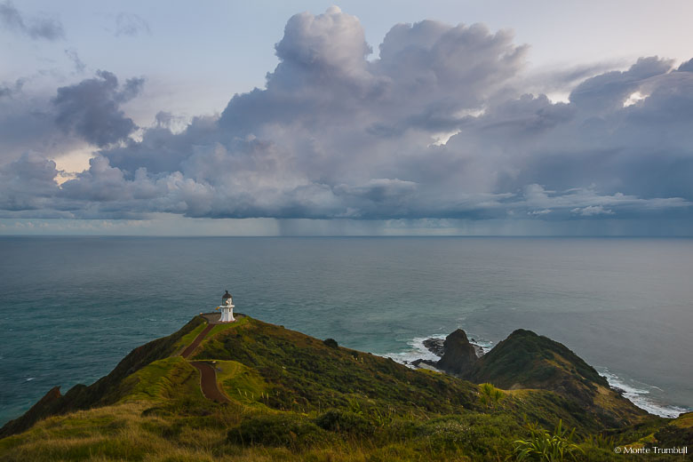 Cape Reinga Lighthouse stands watch over a stormy seascape at the northernmost point on the North Island of New Zealand.