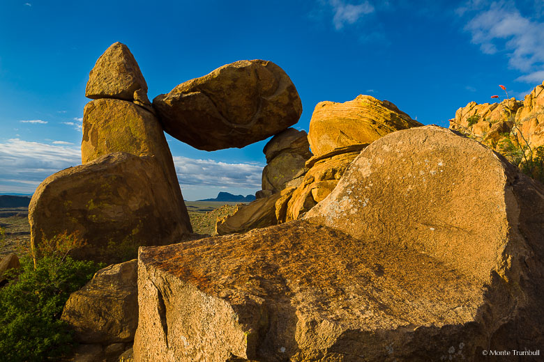 Warm early light shines on the Balanced Rock, a rock formation in Big Bend National Park in Texas.