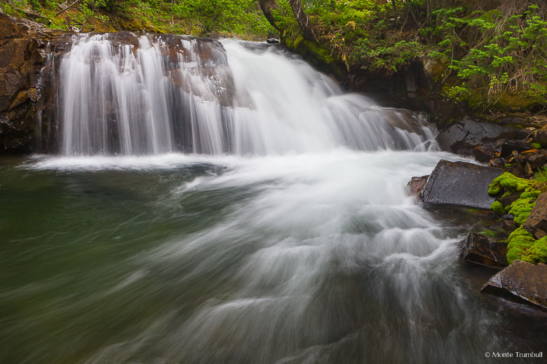 Oh Be Joyful Creek flows over a waterfall on its mad dash down the mountainside to meet up with the Slate River outside Crested Butte, Colorado.